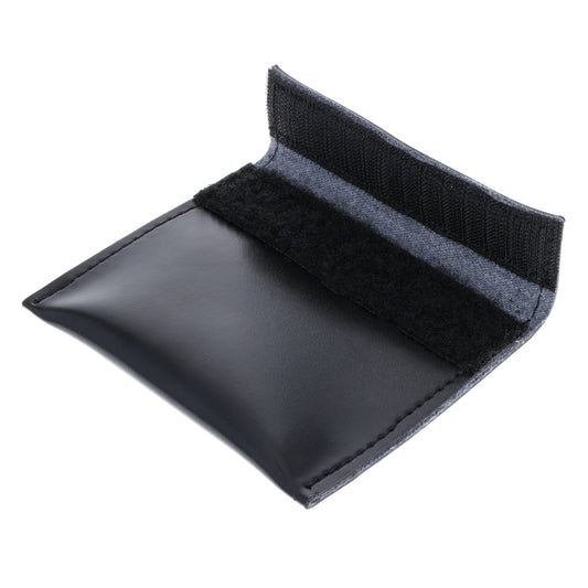 Open black leather glove holder with hook and loop closure flap lifted.