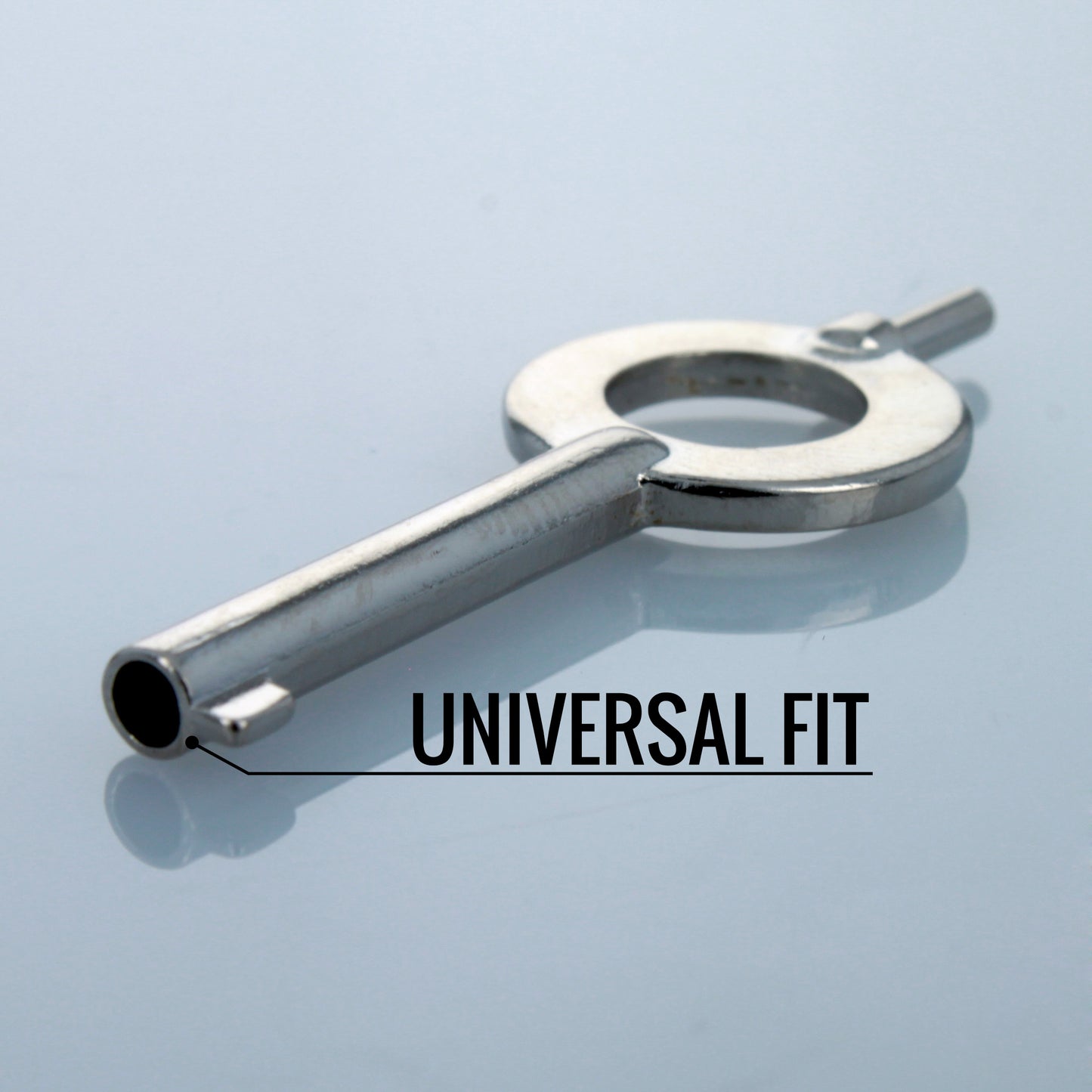 Close-up of universal handcuff key labeled “Universal Fit.”